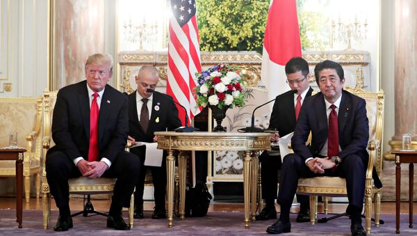 U.S. President Donald Trump meets with Japan's Prime Minister Shinzo Abe for a bilateral meeting in Tokyo, Japan May 27, 2019. REUTERS/Jonathan Ernst - Sputnik International