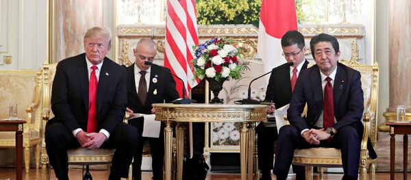U.S. President Donald Trump meets with Japan's Prime Minister Shinzo Abe for a bilateral meeting in Tokyo, Japan May 27, 2019. REUTERS/Jonathan Ernst - Sputnik International