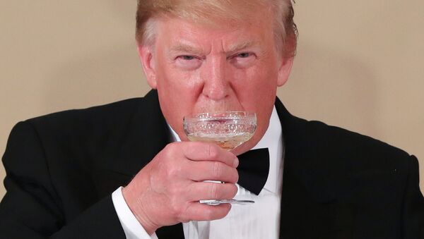 US President Donald Trump drinks during a state banquet at the Imperial Palace in Tokyo, Japan May 27, 2019. - Sputnik International