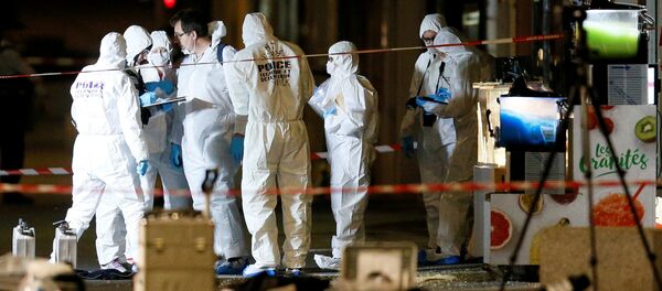 Forensic officers inspect the site of a suspected bomb attack in central Lyon, France May 24, 2019 Forensic officers inspect the site of a suspected bomb attack in central Lyon, France May 24, 2019 - Sputnik International