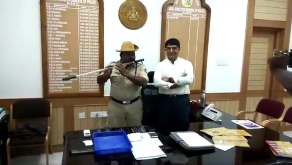 Chandrakant Hutgi, Head Constable from Hubli Rural Police station has converted his Deadly Fiber Lathi into a Musical Instrument... we are proud of him... - Sputnik International
