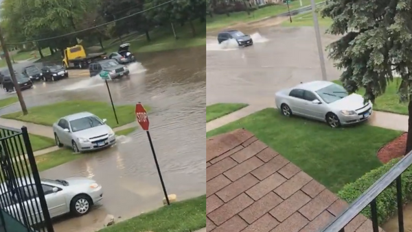 Off the Flooded Path: Chicago Motorist’s Unconventional Detour - Sputnik International