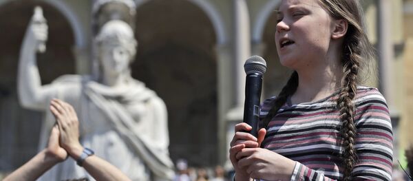 Swedish teenager and environmental activist Greta Thunberg speaks during a Fridays for Future rally, in Rome, Friday, April 19, 2019. Thunberg was in Rome to headline Friday's school strike, the growing worldwide youth movement she spearheaded, demanding faster action against climate change. Swedish teenager and environmental activist Greta Thunberg speaks during a Fridays for Future rally, in Rome, Friday, April 19, 2019. Thunberg was in Rome to headline Friday's school strike, the growing worldwide youth movement she spearheaded, demanding faster action against climate change. - Sputnik International