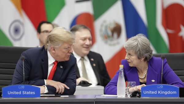 Britain's Prime Minister Theresa May, right, listens to President Donald Trump during the G20 summit in Buenos Aires, Argentina, Friday, Nov. 30, 2018. - Sputnik International