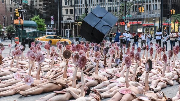 People pose nude holding cut outs of nipples during a photo shoot by artist Spencer Tunick on June 2, 2019 in New York City. Spencer Tunick staged his photo shoot in front of the Facebook building in Manhattan to protest Facebook - Sputnik International