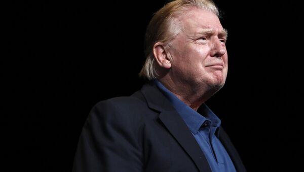 President Donald Trump looks out at the crowd after being prayed for at McLean Bible Church, in Vienna, Va., Sunday June 2, 2019 - Sputnik International