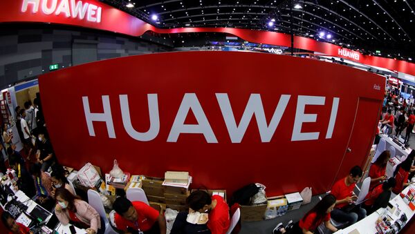  Workers sit at the Huawei stand at the Mobile Expo in Bangkok, Thailand, May 31, 2019 - Sputnik International