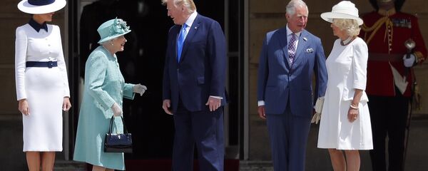 Britain's Queen Elizabeth II greets President Donald Trump, center, and first lady Melania Trump, left, with Britain's Prince Charles and Camilla, Duchess of Cornwall during a ceremonial welcome in the garden of Buckingham Palace in London, Monday, June 3, 2019 on the opening day of a three day state visit to Britain Britain's Queen Elizabeth II greets President Donald Trump, center, and first lady Melania Trump, left, with Britain's Prince Charles and Camilla, Duchess of Cornwall during a ceremonial welcome in the garden of Buckingham Palace in London, Monday, June 3, 2019 on the opening day of a three day state visit to Britain - Sputnik International