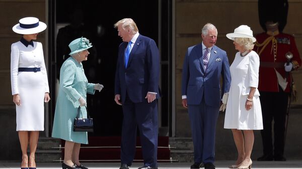 Britain's Queen Elizabeth II greets President Donald Trump, center, and first lady Melania Trump, left, with Britain's Prince Charles and Camilla, Duchess of Cornwall during a ceremonial welcome in the garden of Buckingham Palace in London, Monday, June 3, 2019 on the opening day of a three day state visit to Britain - Sputnik International