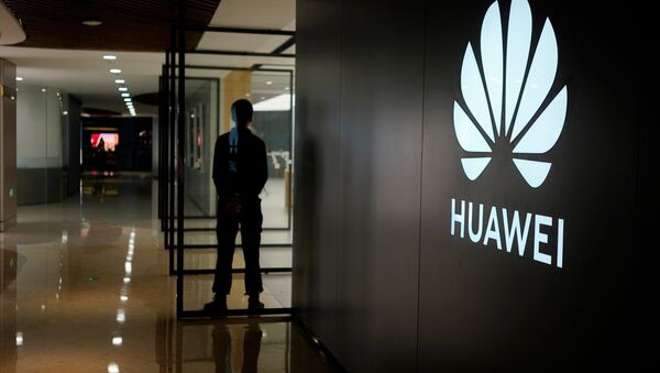 A Huawei company logo is seen at a shopping mall in Shanghai, China June 3, 2019. Picture taken June 3, 2019 - Sputnik International