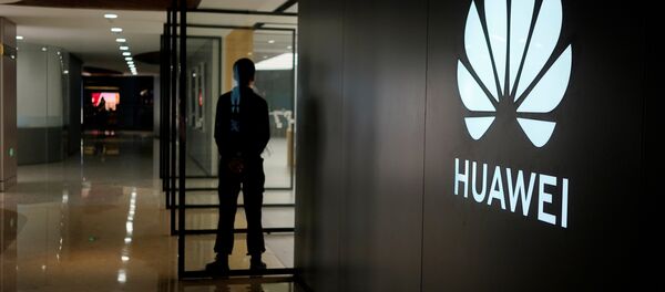 A Huawei company logo is seen at a shopping mall in Shanghai, China June 3, 2019. Picture taken June 3, 2019 - Sputnik International