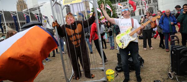 Demonstrators perform as they take part in a protest against U.S. President Donald Trump in London, Britain, June 4, 2019 - Sputnik International