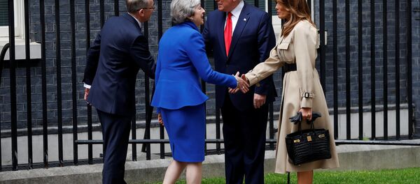 U.S. President Donald Trump and first lady Melania Trump meet Britain's Prime Minister Theresa May and her husband Philip at Downing Street, as part of Trump's state visit in London, Britain, June 4, 2019. - Sputnik International