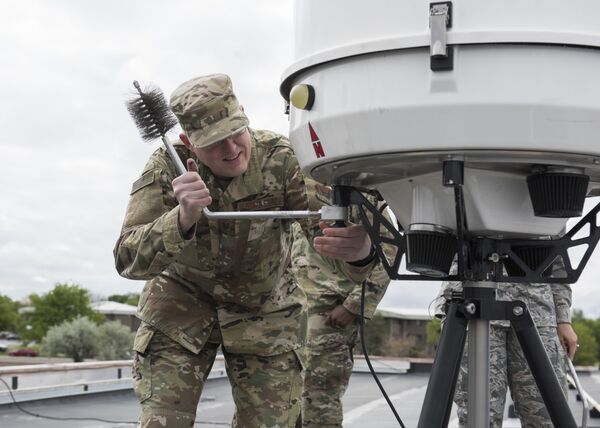 Tech. Sgt. Brandon Knight, 366th Operations Support Squadron weather forecaster, assembles a Portable Doppler Radar May 25, 2019, at Mountain Home Air Force Base, Idaho. Tech. Sgt. Brandon Knight, 366th Operations Support Squadron weather forecaster, assembles a Portable Doppler Radar May 25, 2019, at Mountain Home Air Force Base, Idaho. - Sputnik International
