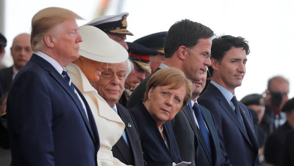 U.S. President Donald Trump, First Lady Melania, German Chancellor Angela Merkel, Dutch Prime Minister Mark Rutte and Canada's Prime Minister Justin Trudeau participate in an event to commemorate the 75th anniversary of D-Day, in Portsmouth, Britain, June 5, 2019 - Sputnik International