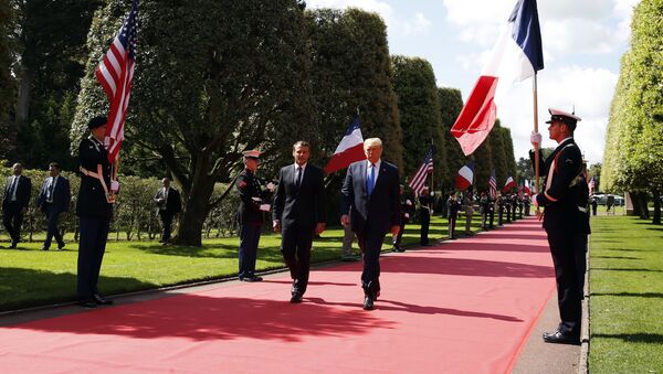 President Donald Trump and French President Emmanuel Macron, arrive to a ceremony to commemorate the 75th anniversary of D-Day at The Normandy American Cemetery, Thursday, June 6, 2019, in Colleville-sur-Mer, Normandy, France - Sputnik International