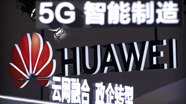  In this Sept. 26, 2018, photo, signs promoting 5G wireless technology from Chinese technology firm Huawei are displayed at the PT Expo in Beijing. A spy chief said in a speech released Tuesday, Oct. 30, 2018 - Sputnik International