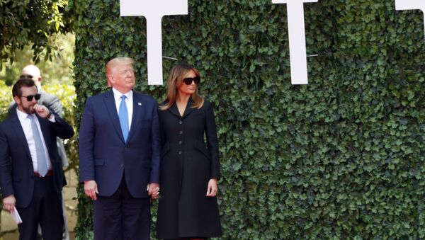 U.S. President Donald Trump and first lady Melania Trump arrive for a ceremony to mark the 75th anniversary of D-Day at the Normandy American Cemetery in Colleville-sur-Mer, Normandy, France, Thursday, June 6, 2019. World leaders are gathered Thursday in France to mark the 75th anniversary of the D-Day landings. (AP Photo/Thibault Camus) - Sputnik International