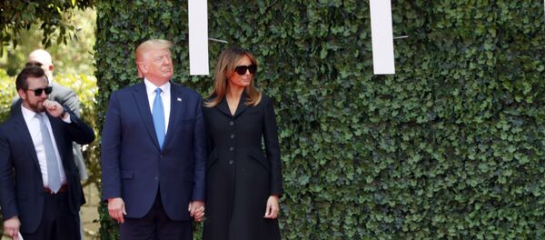 U.S. President Donald Trump and first lady Melania Trump arrive for a ceremony to mark the 75th anniversary of D-Day at the Normandy American Cemetery in Colleville-sur-Mer, Normandy, France, Thursday, June 6, 2019. World leaders are gathered Thursday in France to mark the 75th anniversary of the D-Day landings. (AP Photo/Thibault Camus) U.S. President Donald Trump and first lady Melania Trump arrive for a ceremony to mark the 75th anniversary of D-Day at the Normandy American Cemetery in Colleville-sur-Mer, Normandy, France, Thursday, June 6, 2019. World leaders are gathered Thursday in France to mark the 75th anniversary of the D-Day landings. (AP Photo/Thibault Camus) - Sputnik International