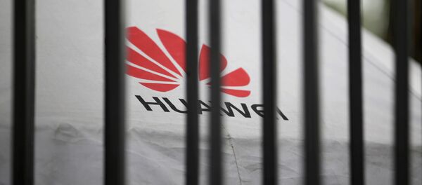 A Huawei logo is seen outside the fence at its headquarters in Shenzhen, Guangdong province, China May 29, 2019 A Huawei logo is seen outside the fence at its headquarters in Shenzhen, Guangdong province, China May 29, 2019 - Sputnik International