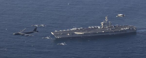 June 1, 2019 file photo, the USS Abraham Lincoln carrier and a U.S. Air Force B-52H Stratofortress, conduct joint exercises in the U.S. Central Command area of responsibility in Arabian sea - Sputnik International