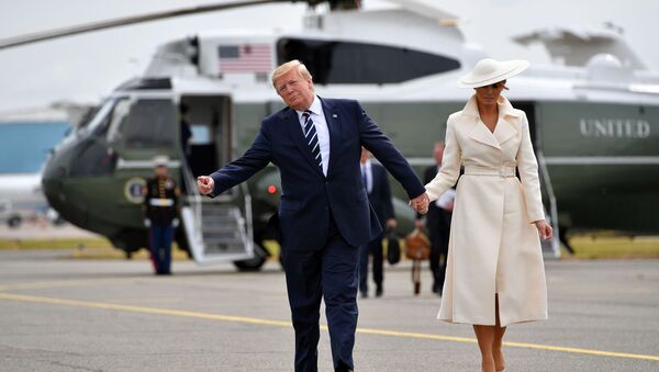 Президент США Дональд Трамп и его супруга Меланья после посещения мероприятия по случаю годовщины высадки в Нормандии - Sputnik International