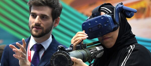 SPIEF 2019 visitor in the HTC Vive VR headset SPIEF 2019 visitor in the HTC Vive VR headset - Sputnik International