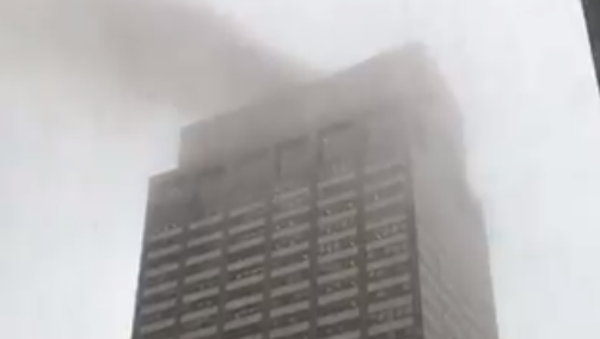 Screenshot of fire following helicopter crash in Manhattan. - Sputnik International