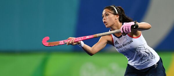 Britain's Sam Quek hits the ball during the women's quarterfinal Britain vs Spain field hockey match at the Rio 2016 Olympics Games at the Olympic Hockey Centre in Rio de Janeiro on 15 August 2016 Britain's Sam Quek hits the ball during the women's quarterfinal Britain vs Spain field hockey match at the Rio 2016 Olympics Games at the Olympic Hockey Centre in Rio de Janeiro on 15 August 2016 - Sputnik International