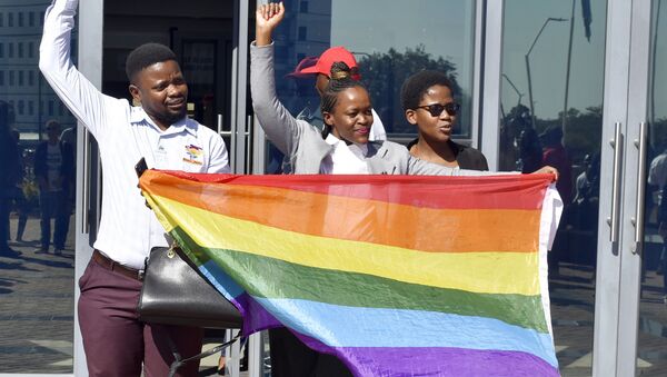 Activists celebrate outside the High Court in Gaborone, Botswana, Tuesday June 11, 2019. Botswana became the latest country to decriminalize gay sex when the High Court rejected as unconstitutional sections of the penal code that punish same-sex relations with up to seven years in prison. - Sputnik International