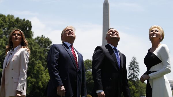 President Donald Trump, first lady Melania Trump, Polish President Andrzej Duda, and his wife Agata Kornhauser-Duda watch a flyover of two F-35 Joint Strike Fighter aircraft at the White House, Wednesday, June 12, 2019, in Washington. - Sputnik International