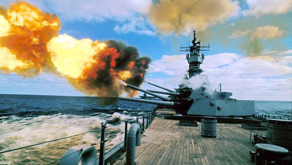 In this Dec. 16, 1987 file photo, the battleship USS Iowa fires its 16-inch guns during duty in the Persian Gulf. - Sputnik International