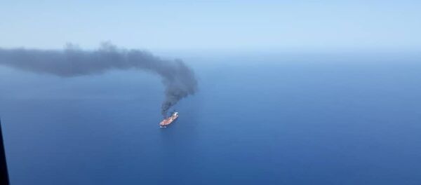 An oil tanker is seen after it was attacked in the Gulf of Oman, June 13, 2019 - Sputnik International