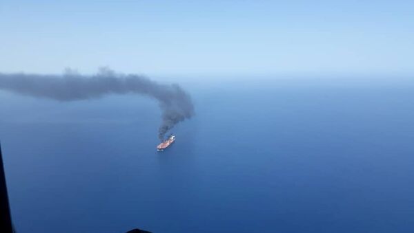 An oil tanker is seen after it was attacked in the Gulf of Oman, June 13, 2019 - Sputnik International
