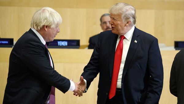President Donald Trump shakes hands with British Foreign Secretary Boris Johnson during the Reforming the United Nations: Management, Security, and Development meeting during the United Nations General Assembly, Monday, Sept. 18, 2017, in New York. - Sputnik International