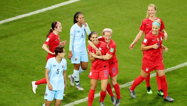 Soccer Football - Women's World Cup - Group F - United States v Thailand - Stade Auguste-Delaune, Reims, France - June 11, 2019 Alex Morgan of the U.S. celebrates scoring their fifth goal with team mates - Sputnik International
