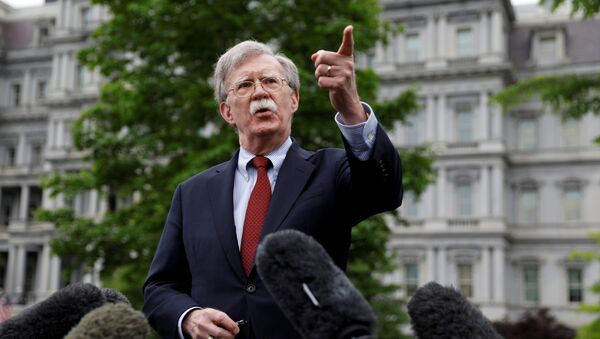 US national security adviser John Bolton talks to reporters at the White House  - Sputnik International