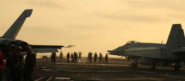 US Navy sailors launch an F/A-18 Super Hornet from the flight deck of the aircraft carrier USS Abraham Lincoln in the Arabian Sea, 3 June 2019 US Navy sailors launch an F/A-18 Super Hornet from the flight deck of the aircraft carrier USS Abraham Lincoln in the Arabian Sea, 3 June 2019 - Sputnik International