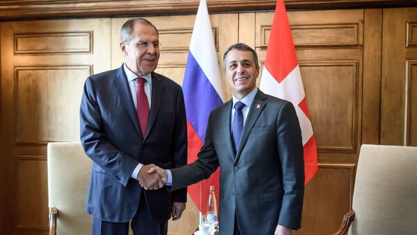 Russian Foreign Minister Sergei Lavrov (L) shakes hands with Swiss Foreign Minister Ignazio Cassis  (File) - Sputnik International