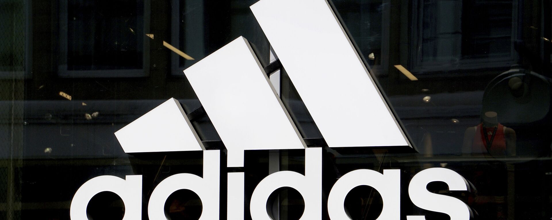 The logo of the sports goods manufacturer 'adidas' is pictured in Berlin, Germany, Monday, May 6, 2019 - Sputnik International, 1920, 19.06.2019