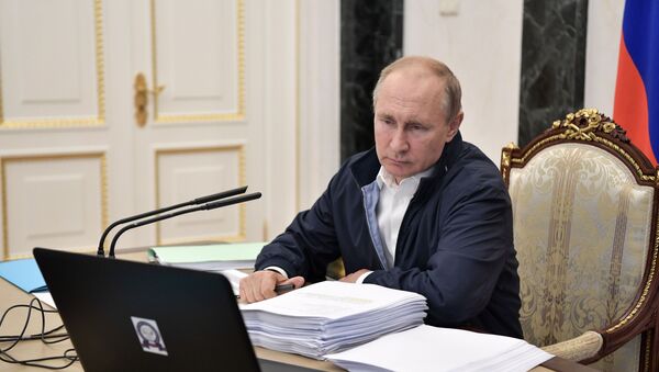 Russian President Vladimir Putin chairs a meeting ahead of his annual question and answer session which is to take place on June 20, in Moscow, Russia - Sputnik International