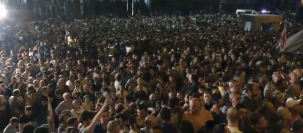 thousands of protesters gather outside the parliament building in the Georgian capital of Tbilisi thousands of protesters gather outside the parliament building in the Georgian capital of Tbilisi - Sputnik International