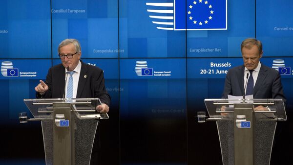 European Commission President Jean-Claude Juncker, left, and European Council President Donald Tusk participate in a media conference at an EU summit in Brussels - Sputnik International