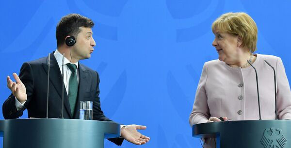 Ukraine's new President Vladimir Zelensky and German Chancellor Angela Merkel  - Sputnik International
