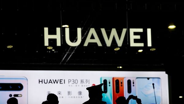 A Huawei company logo is seen at CES (Consumer Electronics Show) Asia 2019 in Shanghai, China  - Sputnik International