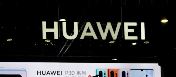 A Huawei company logo is seen at CES (Consumer Electronics Show) Asia 2019 in Shanghai, China  - Sputnik International