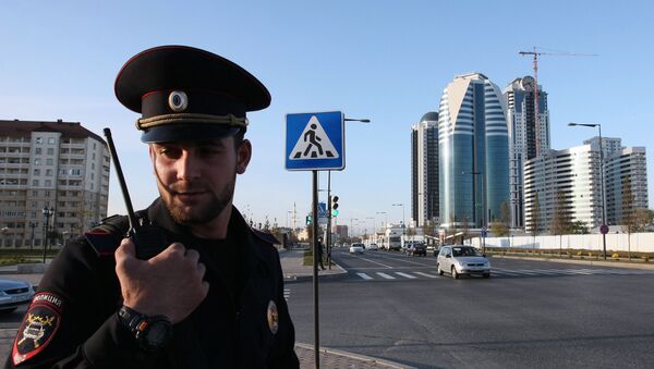 A police officer patrolling the streets in the city of Grozny - Sputnik International