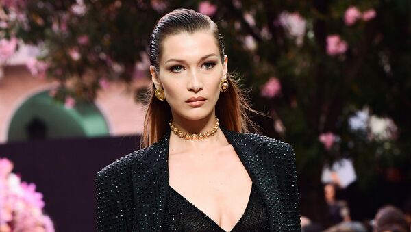 US model Bella Hadid model presents a creation for fashion house Versace during the presentation of its women's and men's spring/summer 2020 fashion collection in Milan on June 15, 2019 - Sputnik International