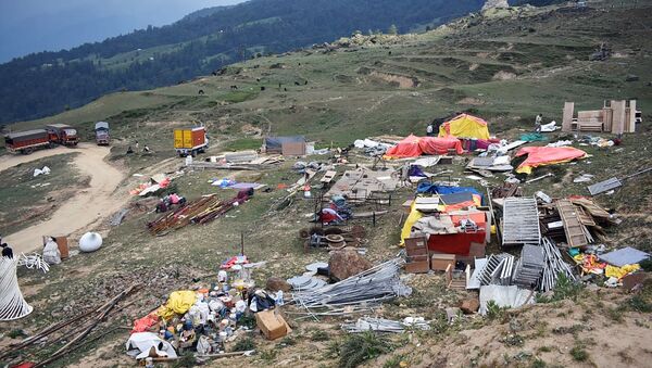 A general view shows waste left behind following the large-scale weddings of the brothers Suryakant and Shashank Gupta of the South Africa-based Gupta family, following days of celebrations in the Auli hill station in Uttarakhand state on June 24, 2019 - Sputnik International