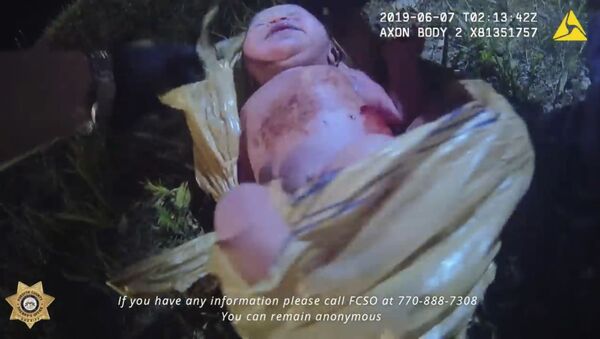 Newborn found alive in woods - Sputnik International
